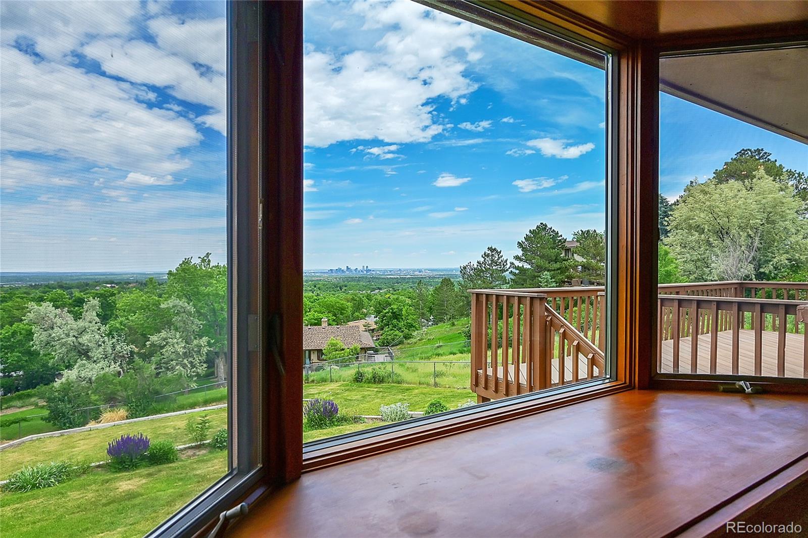 12377 West Louisiana Avenue Lakewood, CO 80228 - Photo 7 of 50 a view of balcony with floor to ceiling windows with wooden floor