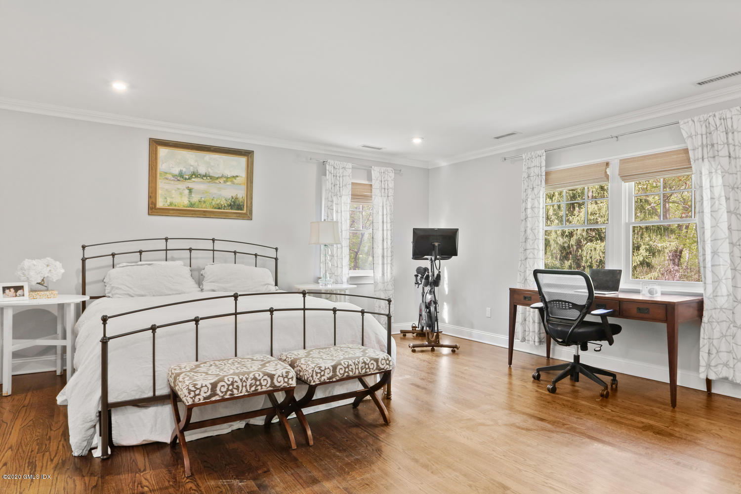 277 Cognewaugh Road Cos Cob, CT 06807 - Photo 21 of 34 a bedroom with furniture and a window
