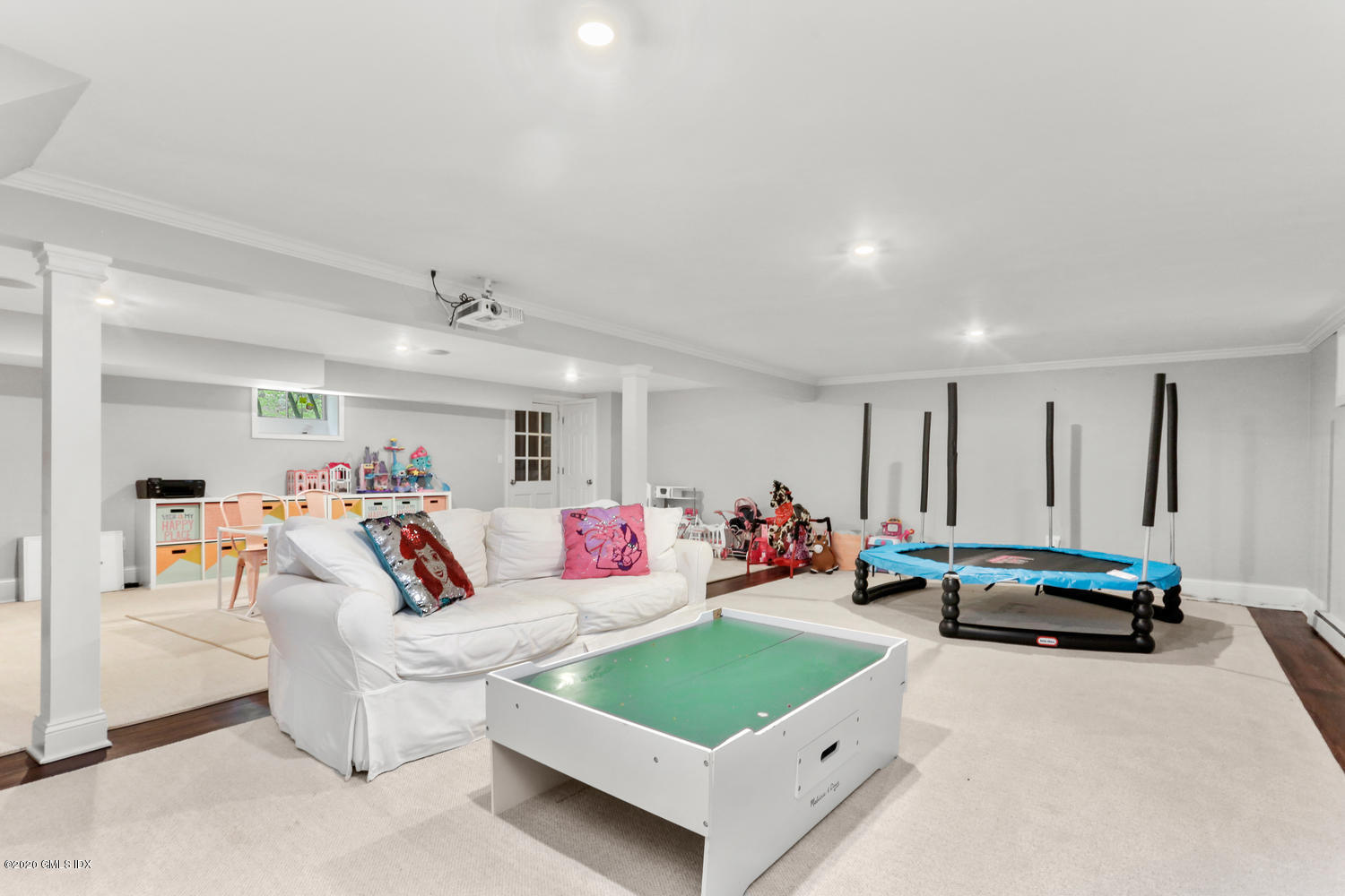 277 Cognewaugh Road Cos Cob, CT 06807 - Photo 25 of 34 a living room with furniture and a table