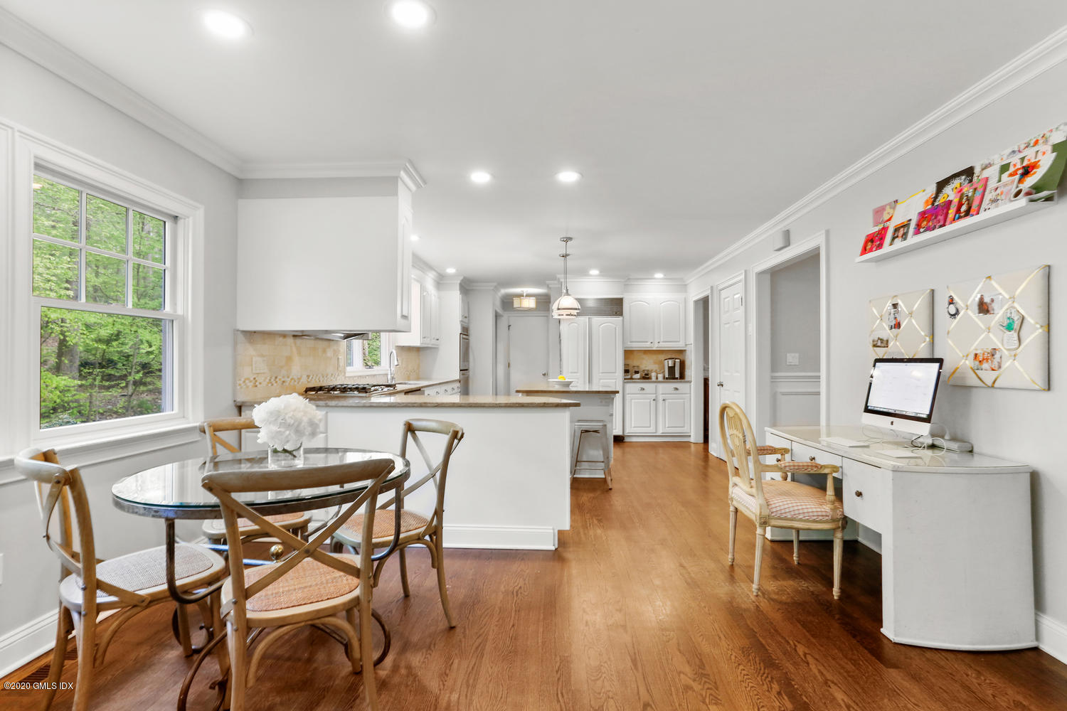 277 Cognewaugh Road Cos Cob, CT 06807 - Photo 9 of 34 a dining room with furniture and a wooden floor