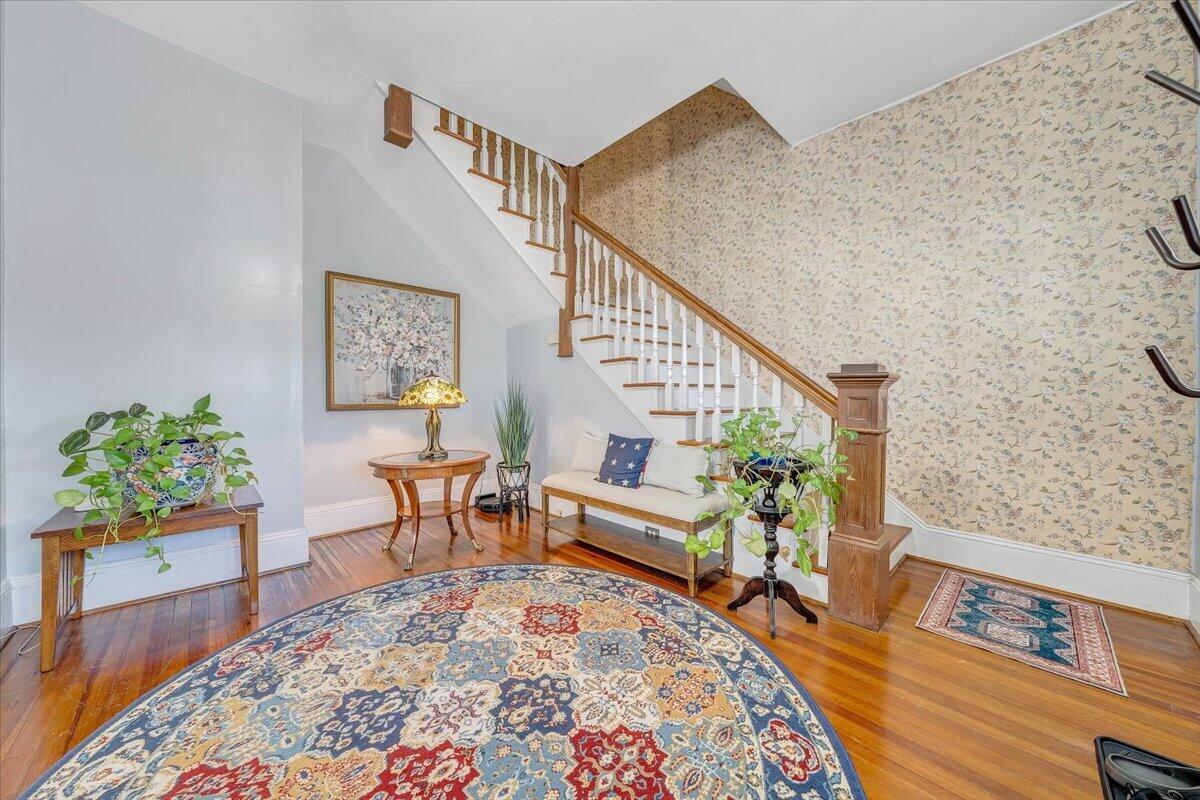1307 Maple Avenue Southwest Roanoke, VA 24016 - Photo 12 of 53 a living room with furniture and a wooden floor
