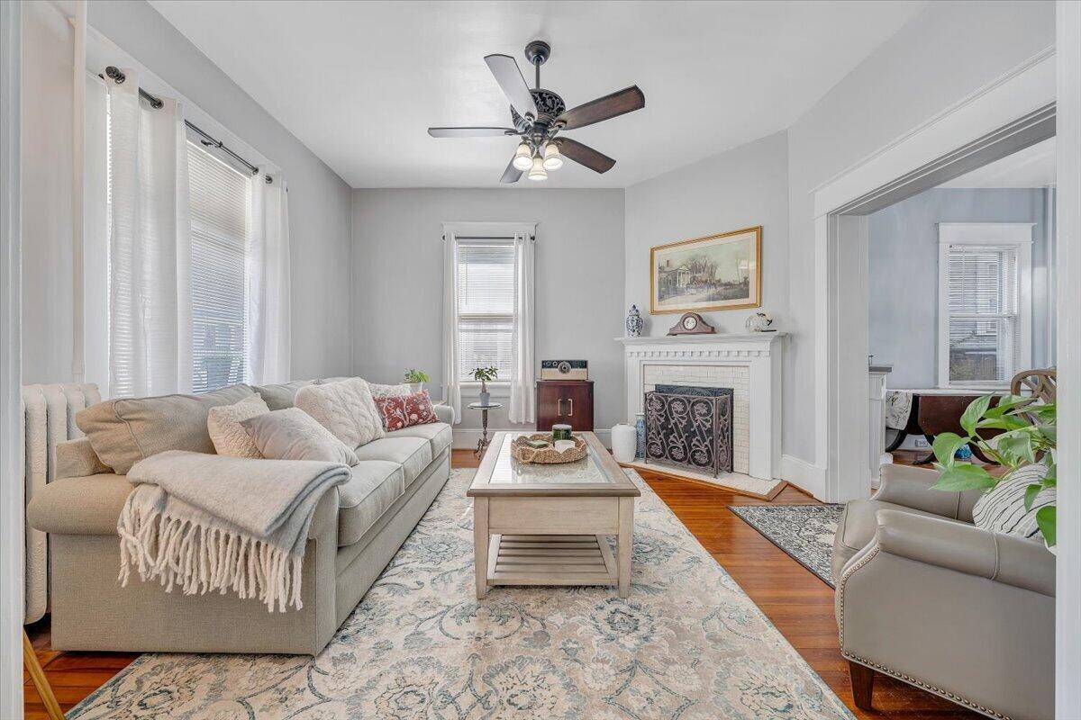 1307 Maple Avenue Southwest Roanoke, VA 24016 - Photo 14 of 53 a living room with furniture a fireplace and a window