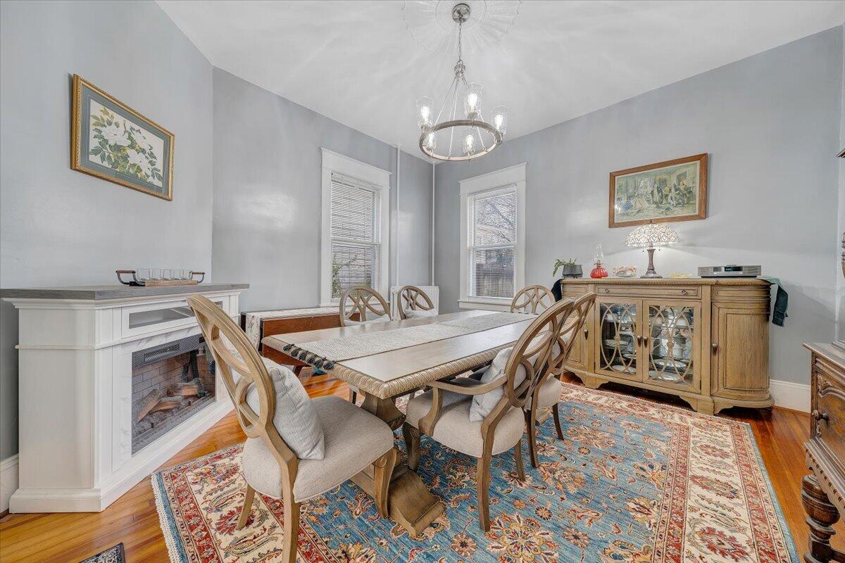 1307 Maple Avenue Southwest Roanoke, VA 24016 - Photo 20 of 53 a view of a dining room with furniture and wooden floor