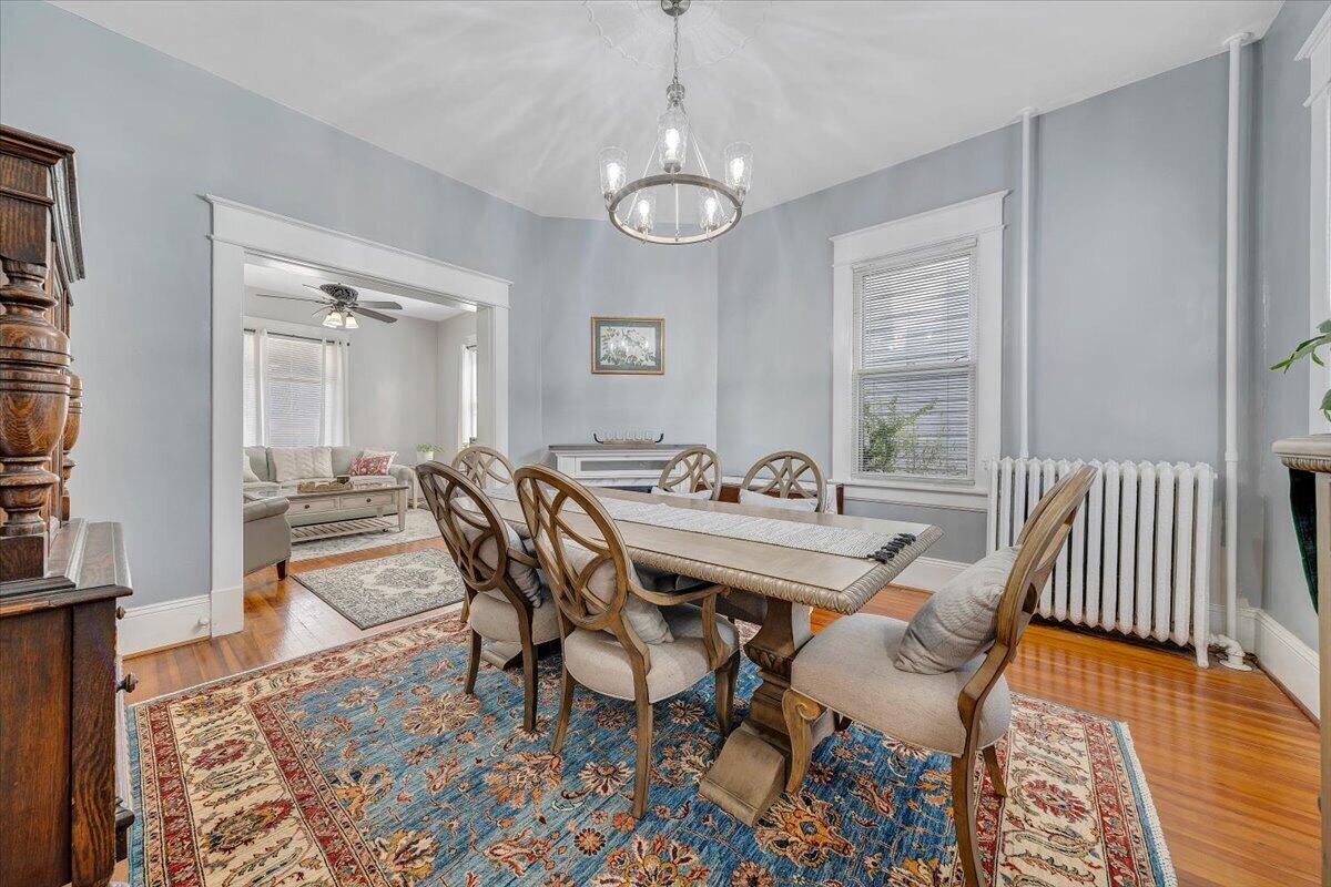 1307 Maple Avenue Southwest Roanoke, VA 24016 - Photo 21 of 53 a view of a dining room with furniture and wooden floor