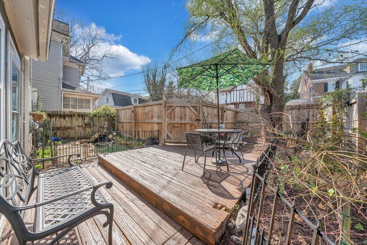 1307 Maple Avenue Southwest Roanoke, VA 24016 - Photo 7 of 53 a view of a patio with table and chairs and potted plants