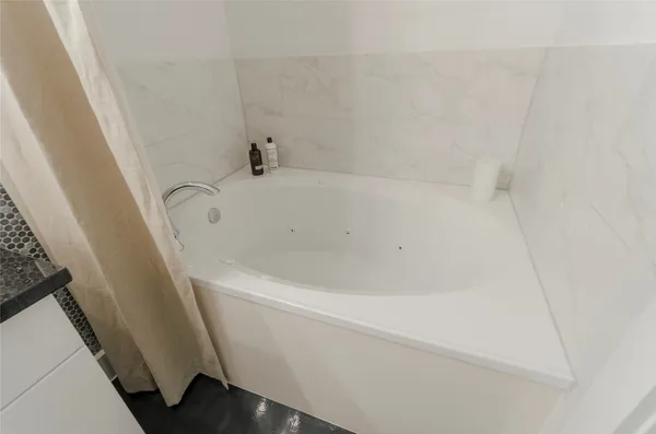 a bathroom with a bathtub