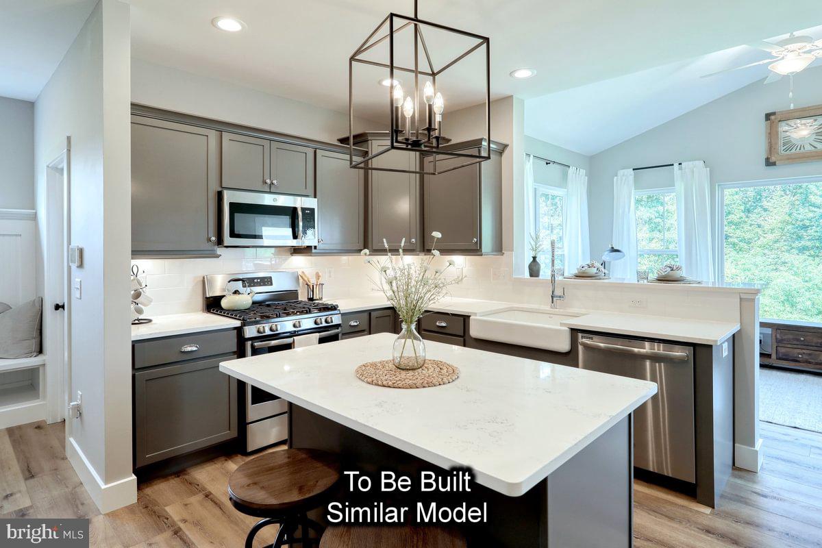 Blue Ridge Pottsville, PA 17901 - Photo 6 of 20 a kitchen with kitchen island a sink counter and chairs