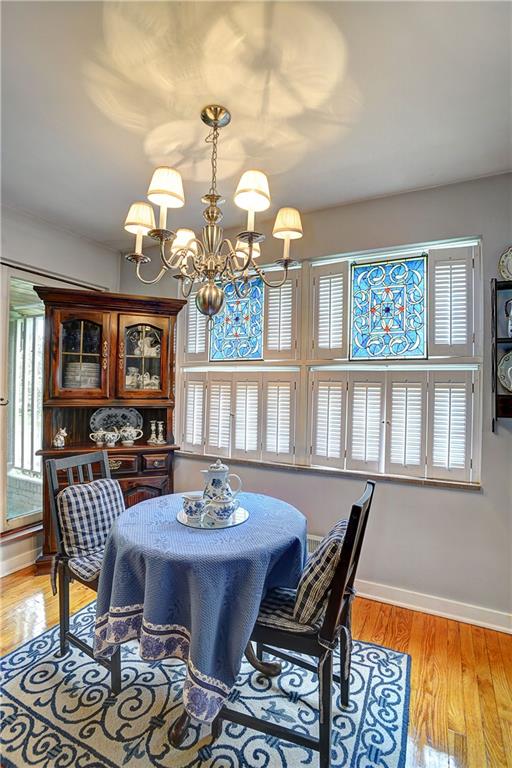 205 Quaker Road Sewickley, PA 15143 - Photo 5 of 18 Dining room has slider to the patio and shuttered windows