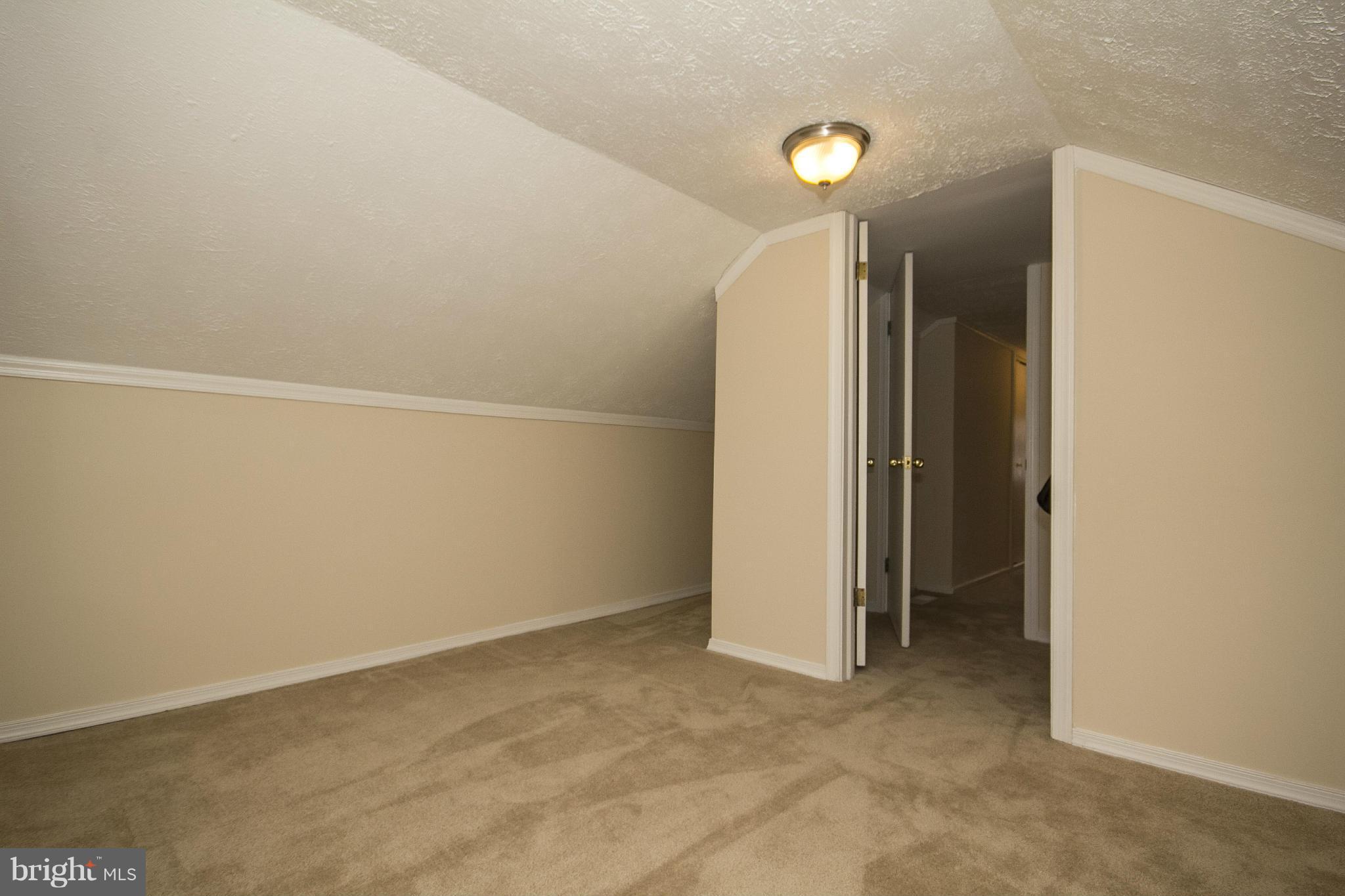 926 Woodlynn Road Baltimore, MD 21221 - Photo 22 of 28 a view of an empty room