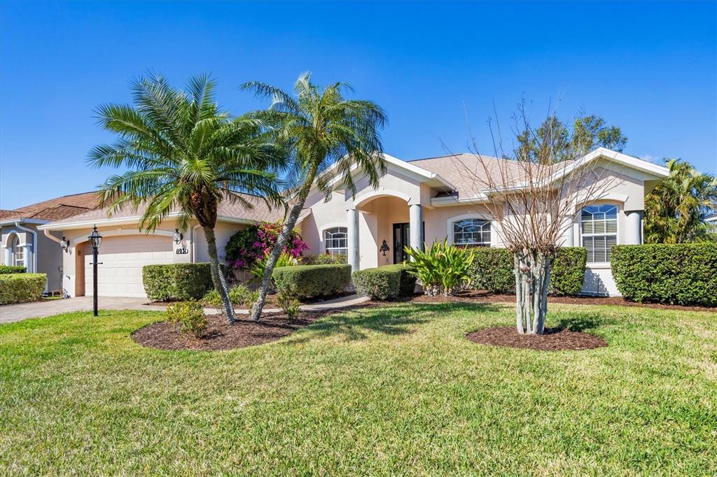11031 Hyacinth Place Lakewood Ranch, FL 34202 - Photo 1 of 1 a front view of a house with a yard