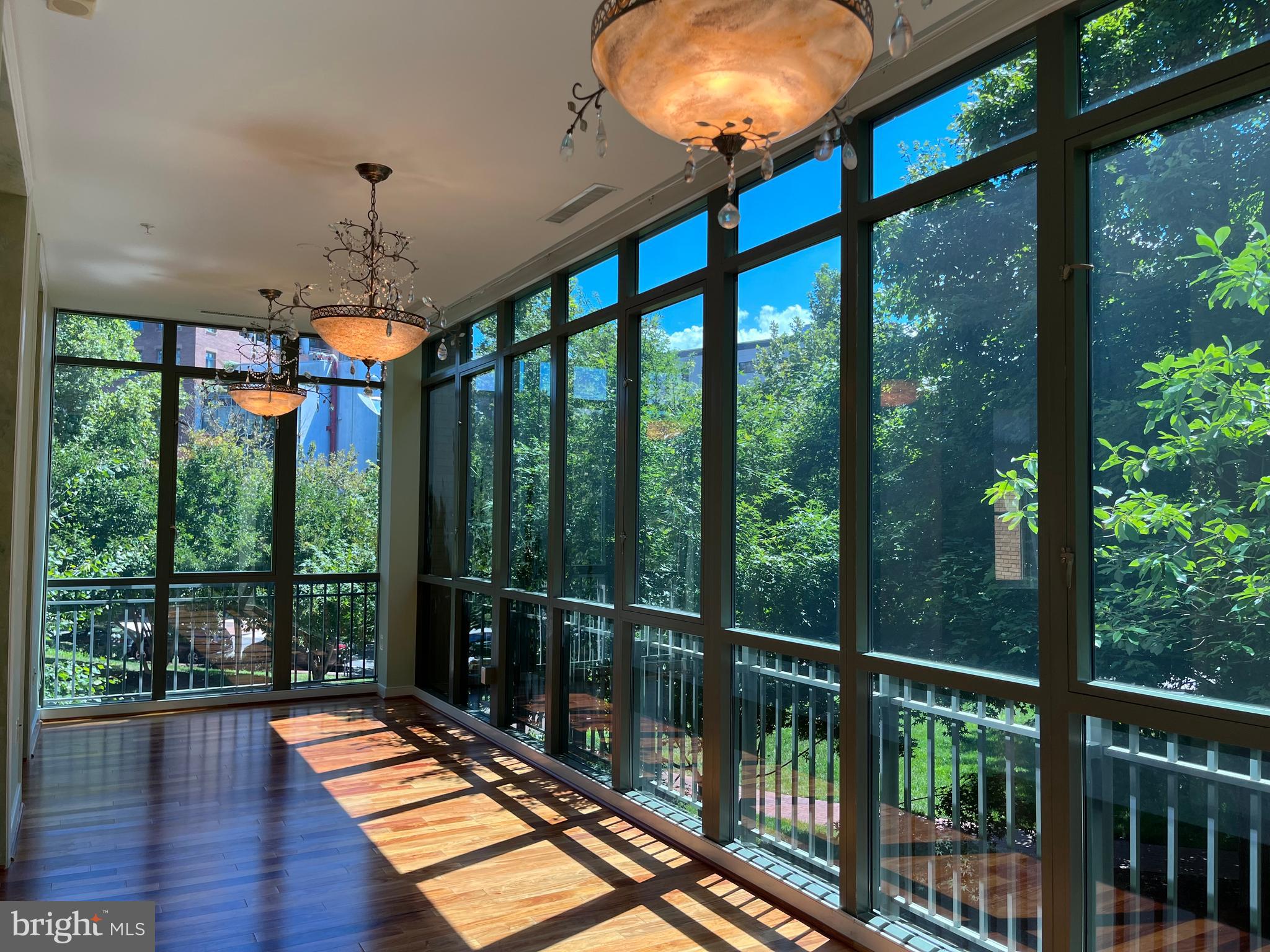 2425 L Street Northwest, Unit 215 Washington, DC 20037 - Photo 17 of 38 a view of a balcony with wooden floor