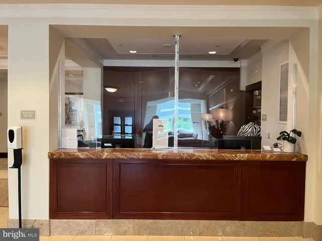 a bedroom with furniture and window