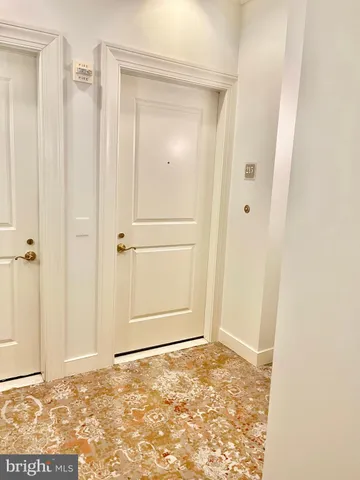 view of a room with a wooden door