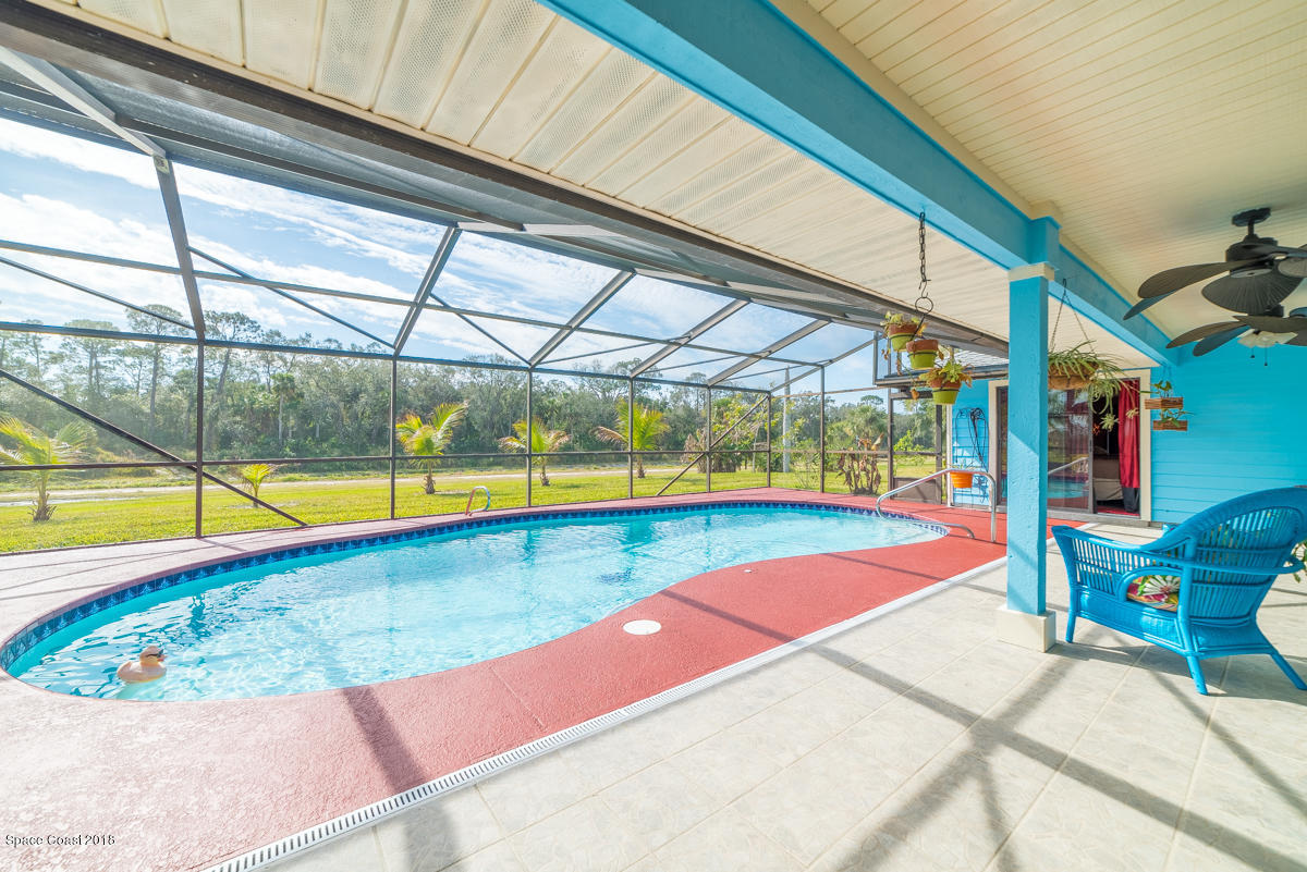 1508 Meadowbrook Road Northeast Palm Bay, FL 32905 - Photo 38 of 42 a view of an outdoor space with swimming pool