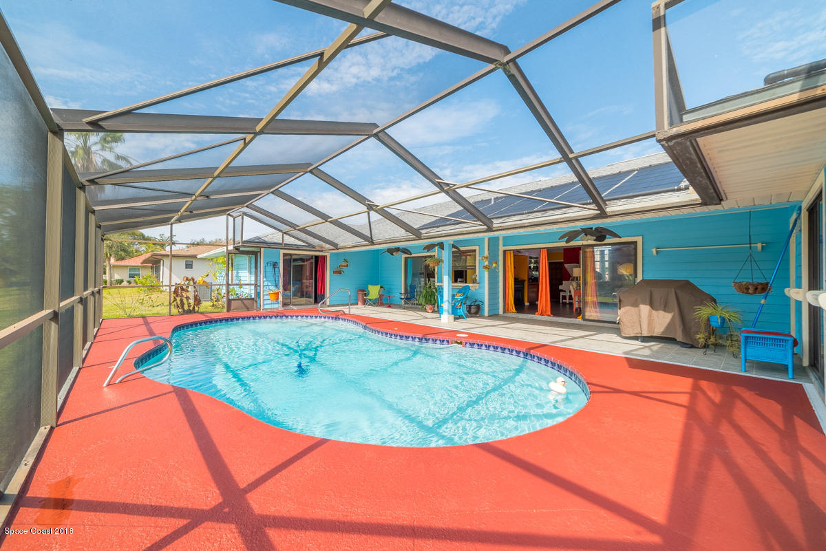 1508 Meadowbrook Road Northeast Palm Bay, FL 32905 - Photo 39 of 42 a view of a swimming pool with a patio