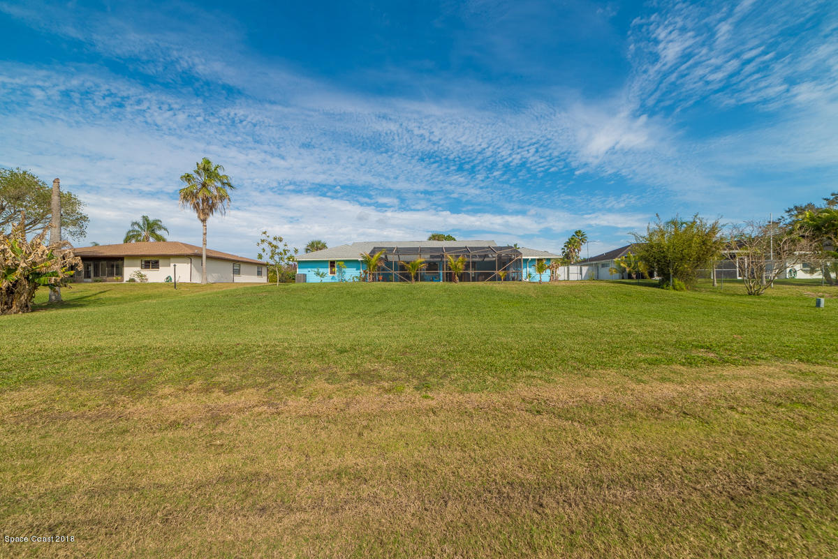 1508 Meadowbrook Road Northeast Palm Bay, FL 32905 - Photo 41 of 42 a view of yard with swimming pool