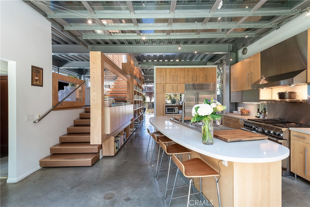 1149 Pine Avenue Manhattan Beach, CA 90266 - Photo 12 of 43 a dining room with furniture and a chandelier