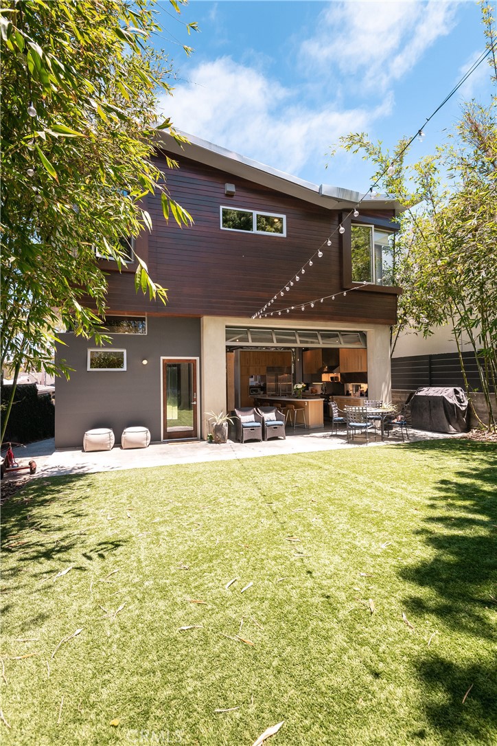 1149 Pine Avenue Manhattan Beach, CA 90266 - Photo 15 of 43 a view of swimming pool with lawn chairs and plants