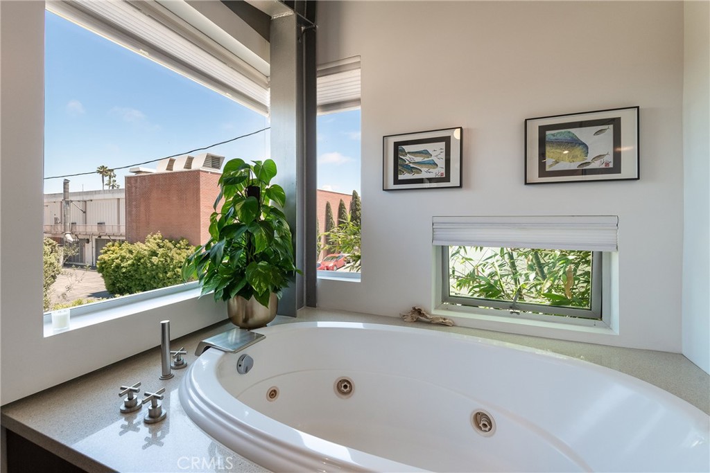 1149 Pine Avenue Manhattan Beach, CA 90266 - Photo 35 of 43 a bathroom with a tub and a window