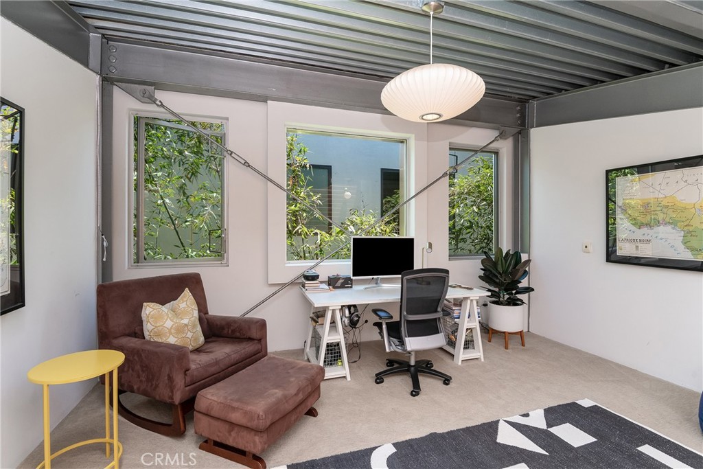 1149 Pine Avenue Manhattan Beach, CA 90266 - Photo 36 of 43 a living room with furniture and a large window
