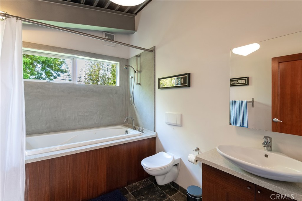 1149 Pine Avenue Manhattan Beach, CA 90266 - Photo 43 of 43 a bathroom with a sink toilet and shower