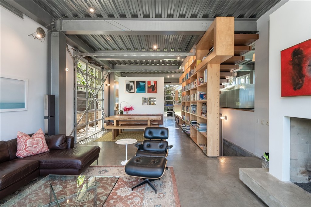 1149 Pine Avenue Manhattan Beach, CA 90266 - Photo 5 of 43 a living room with furniture and a chandelier