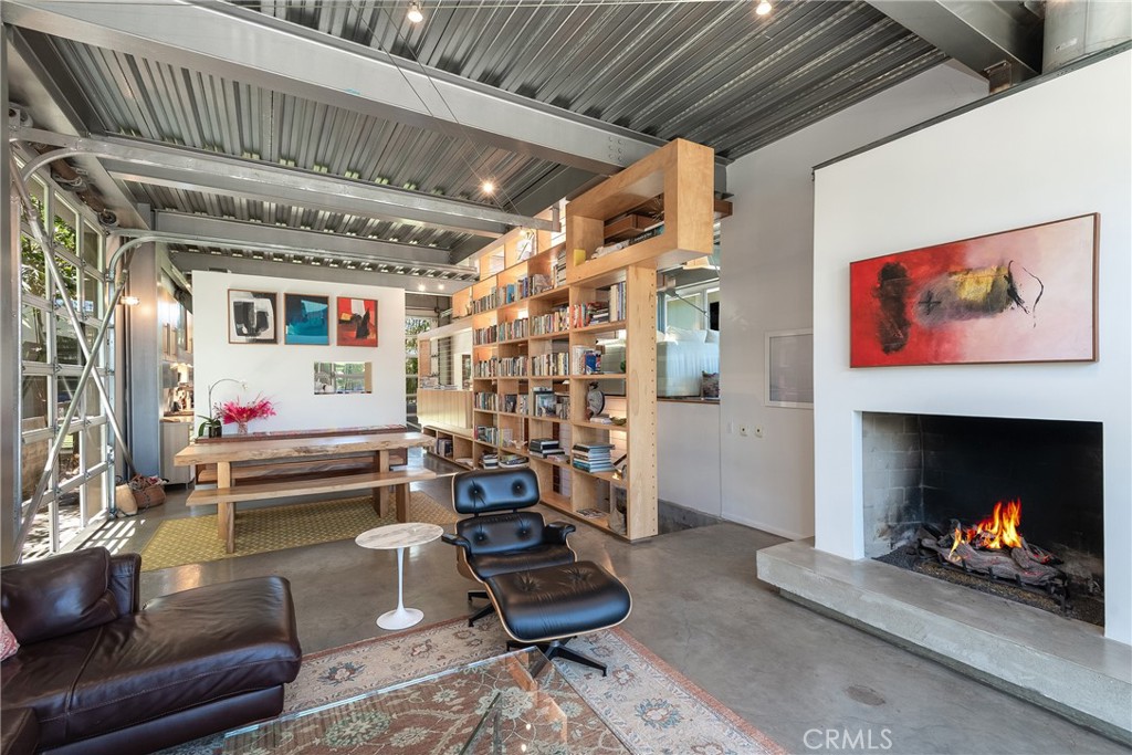 1149 Pine Avenue Manhattan Beach, CA 90266 - Photo 6 of 43 a living room with furniture and a fireplace