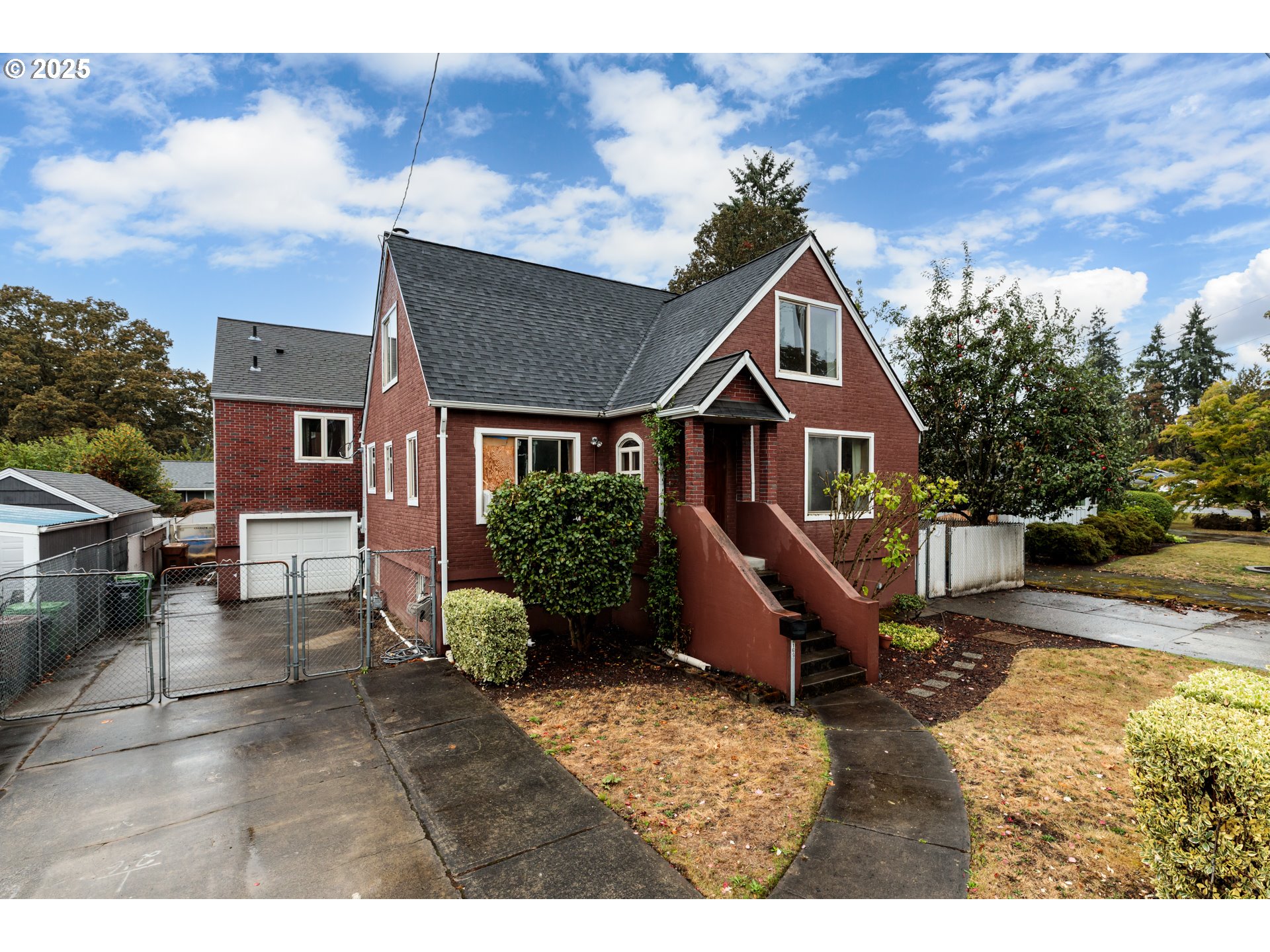 a aerial view of a house with a yard