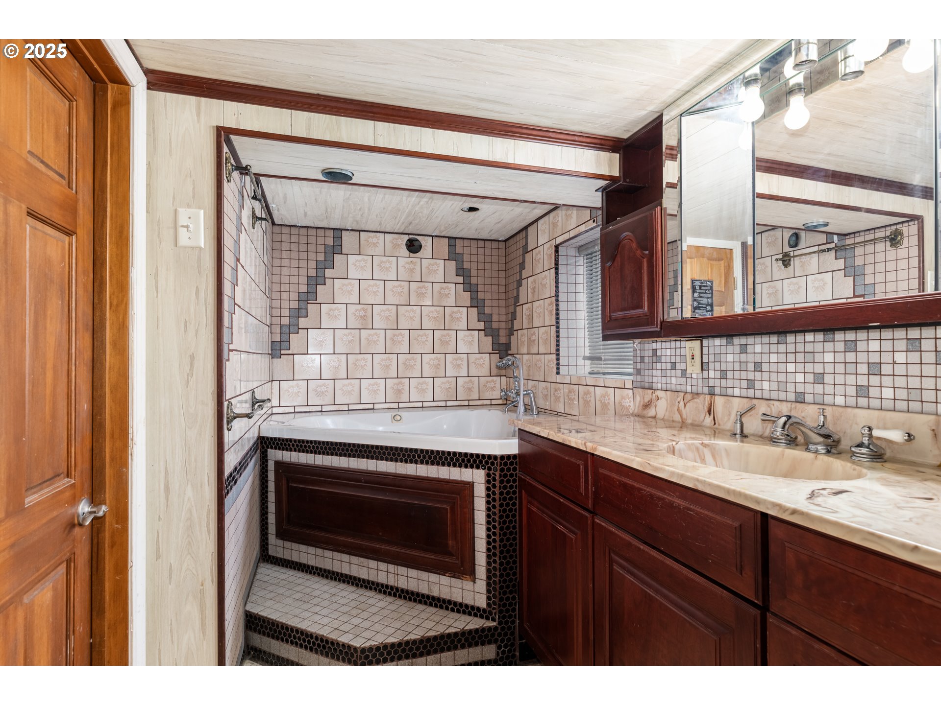169 MacArthur Street St. Helens, OR 97051 - Photo 13 of 31 a bathroom with a sink and a mirror