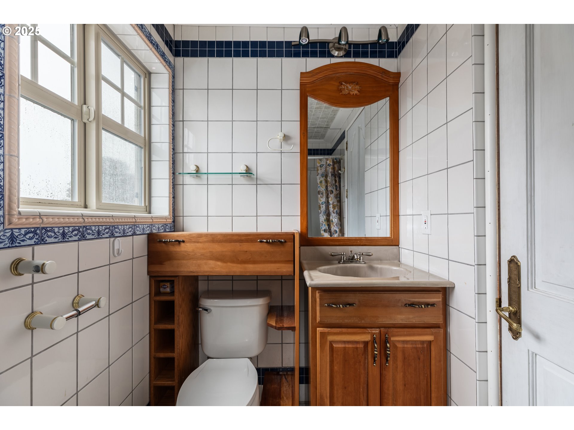 169 MacArthur Street St. Helens, OR 97051 - Photo 22 of 31 a bathroom with a sink and a mirror
