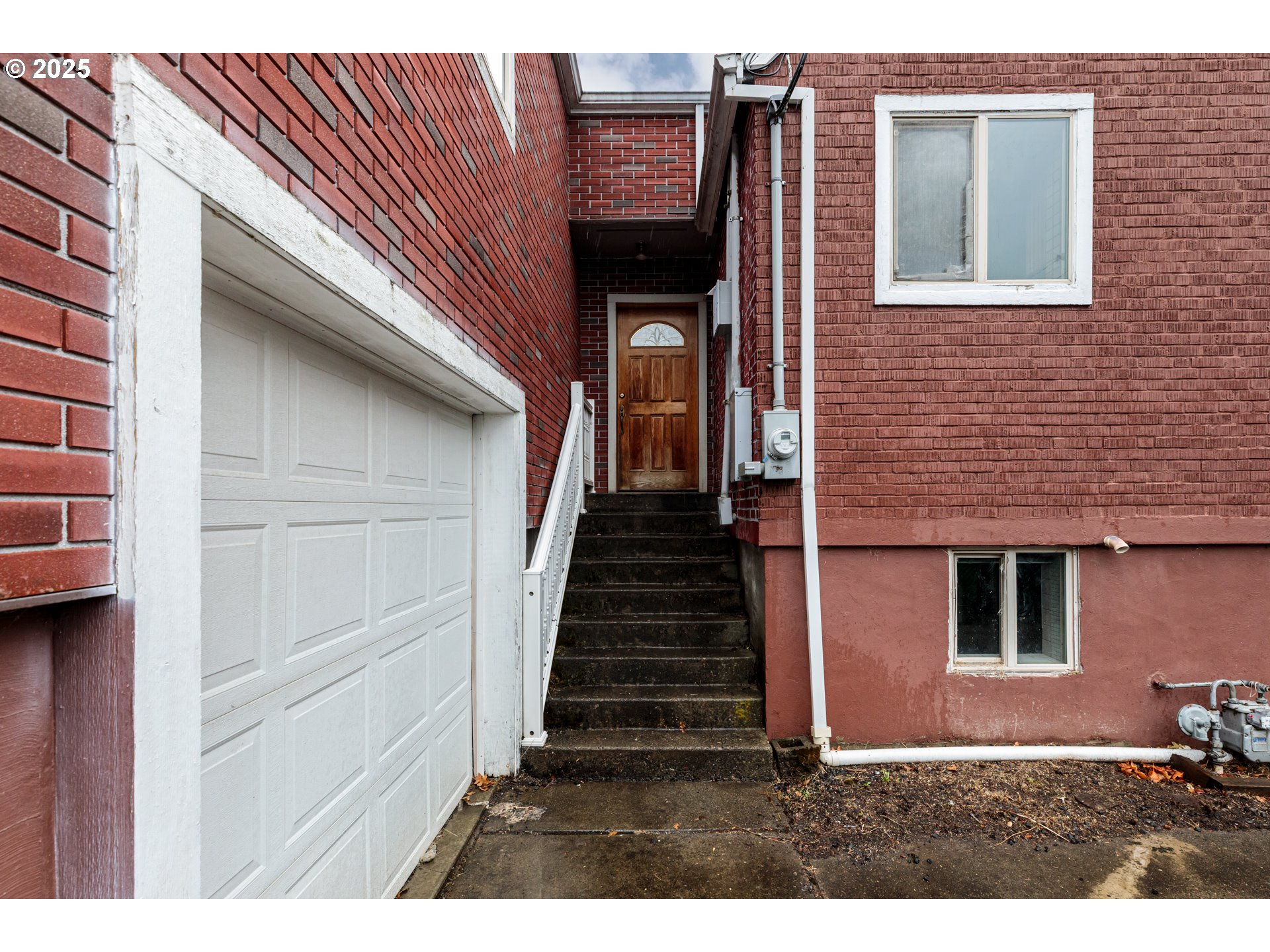 169 MacArthur Street St. Helens, OR 97051 - Photo 26 of 31 a view of a house with wooden door and stairs