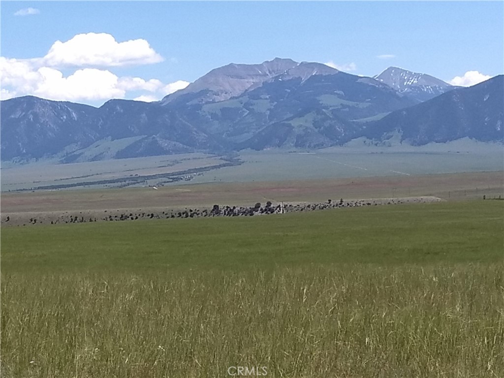 123 Tbd Raghorn Court Ennis, MT 59729 - Photo 1 of 18 a view of a lake in middle of the town