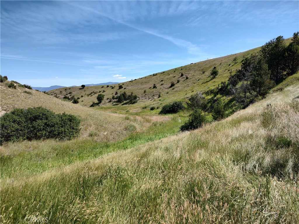 123 Tbd Raghorn Court Ennis, MT 59729 - Photo 3 of 18 a view of a large mountains with lots of green space