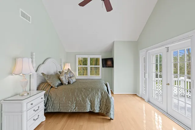 a living room with couch and windows