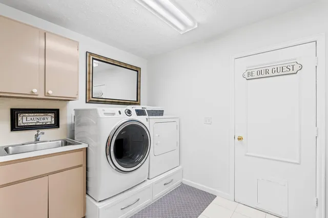 a utility room with a sink