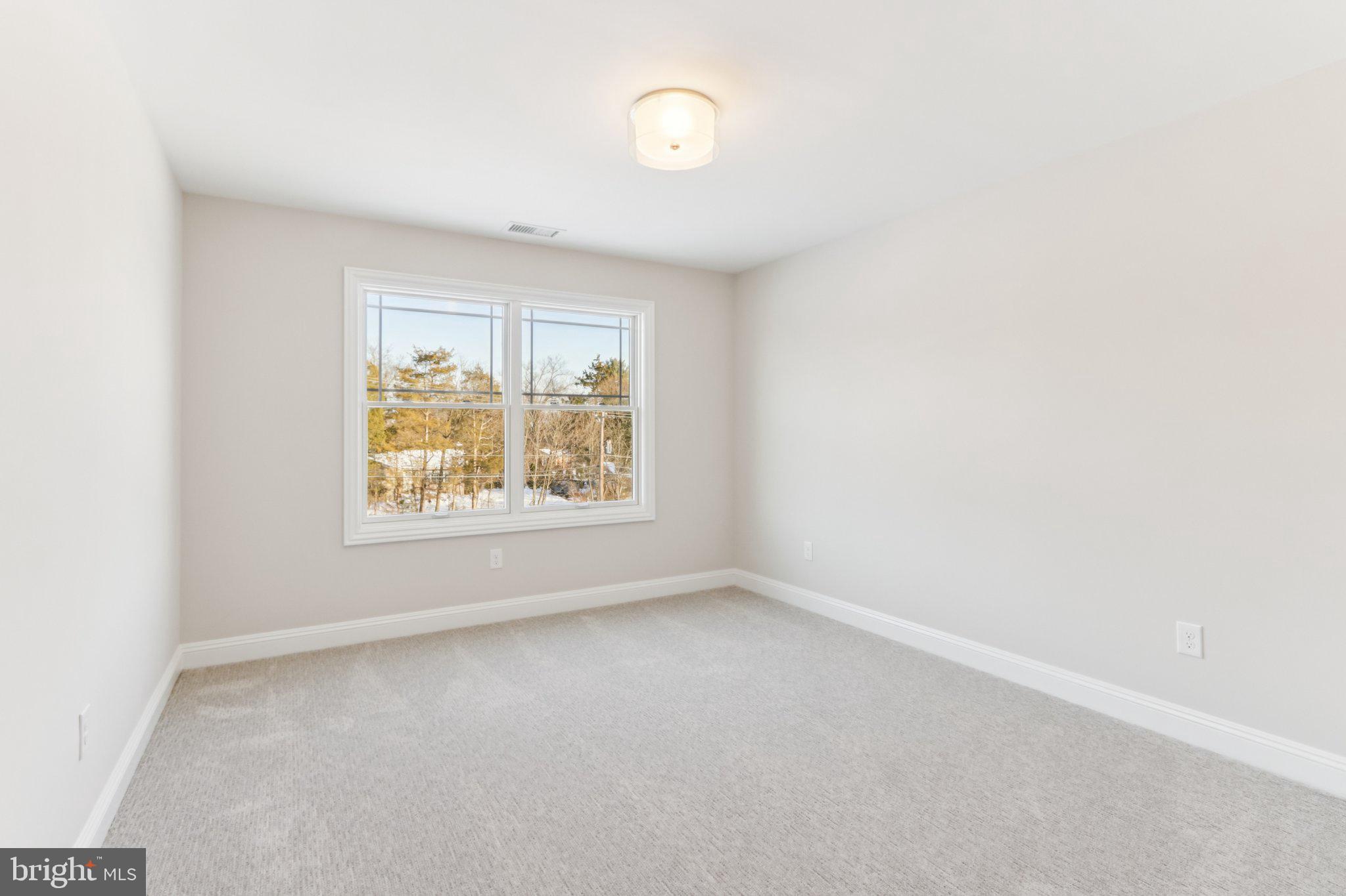 510 Newcomen Road, Unit B3D Exton, PA 19341 - Photo 63 of 74 an empty room with a window
