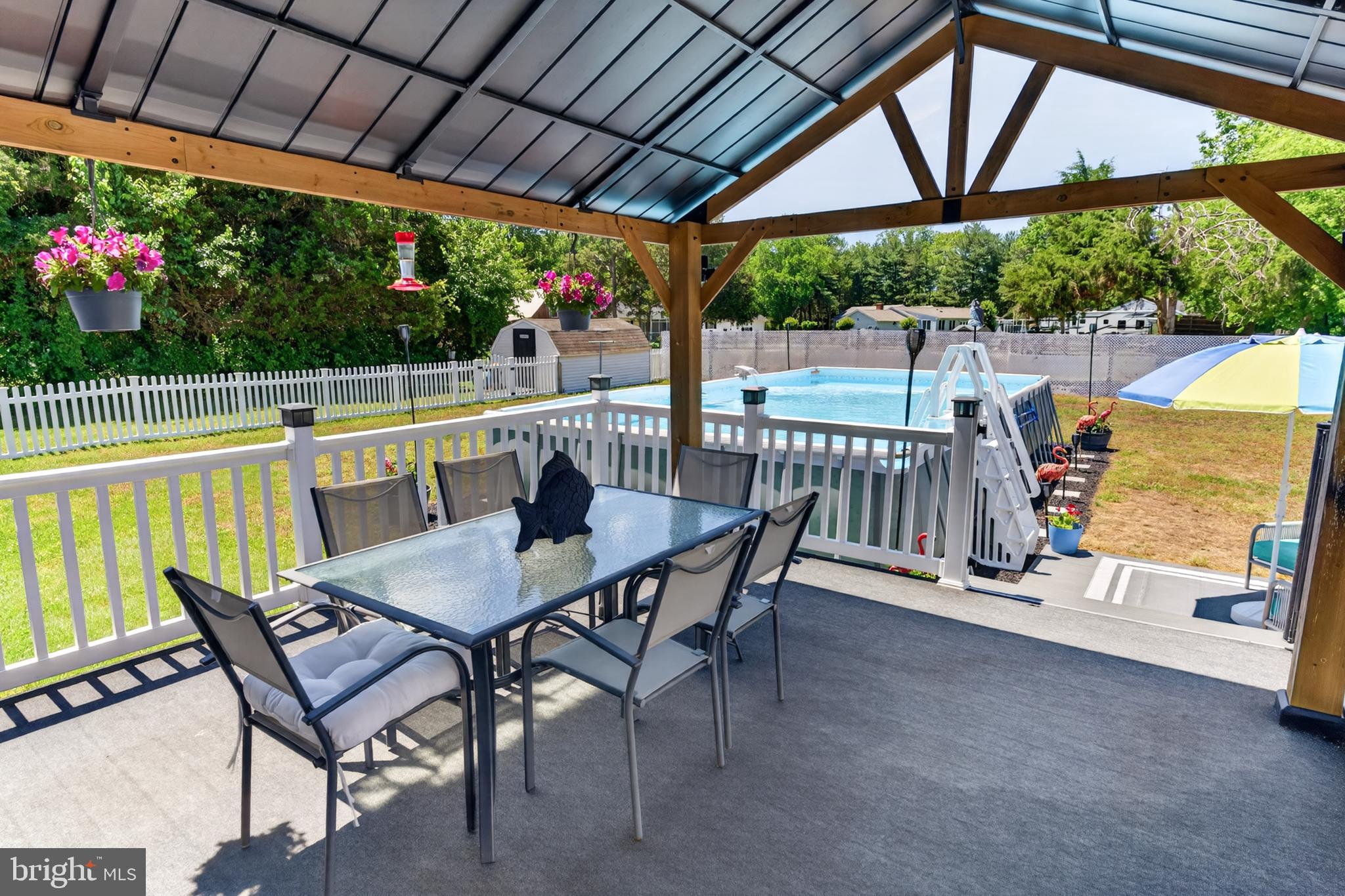 5440 Moose Lodge Road Cambridge, MD 21613 - Photo 46 of 63 Rear deck w/ covered entertaining space!