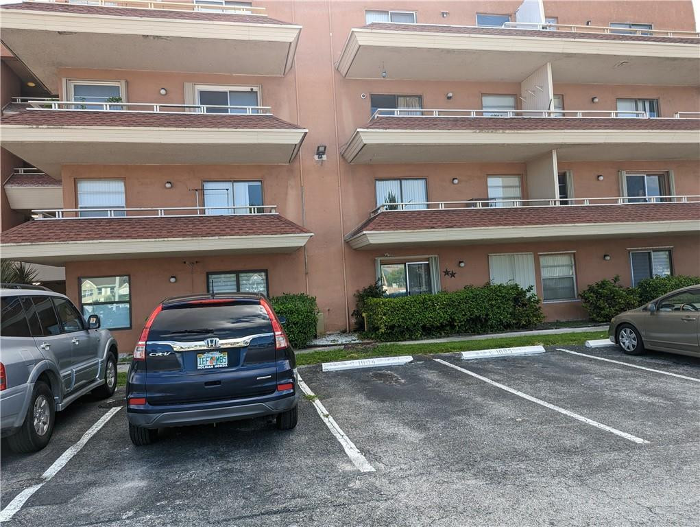 a car parked in front of a building
