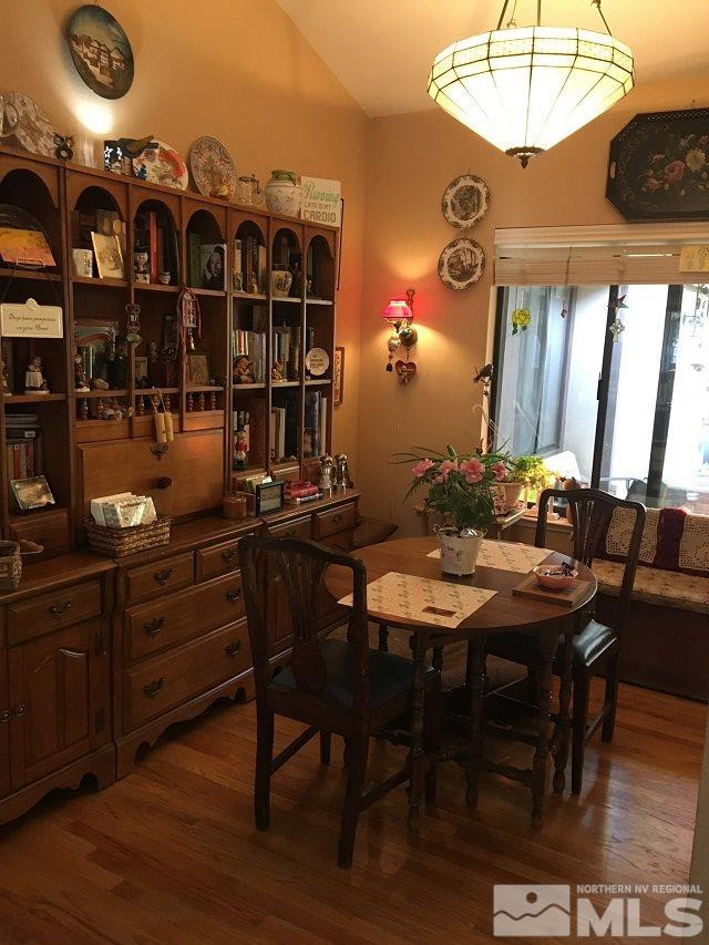 1611 Foster Drive Reno, NV 89509 - Photo 13 of 35 a kitchen with a dining table and chairs