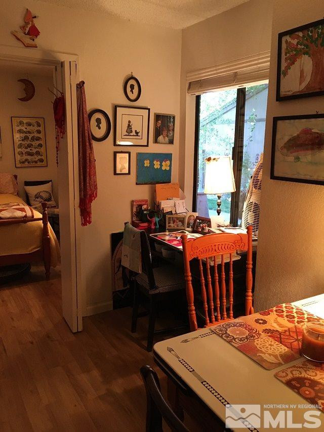 1611 Foster Drive Reno, NV 89509 - Photo 26 of 35 a view of a dining room with furniture window and outside view
