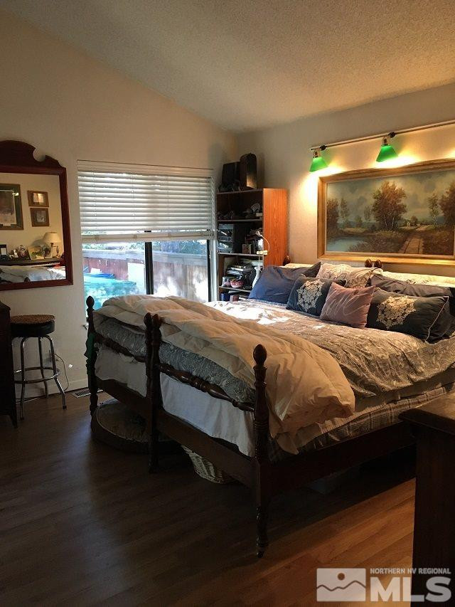 1611 Foster Drive Reno, NV 89509 - Photo 27 of 35 a bedroom with bed and window