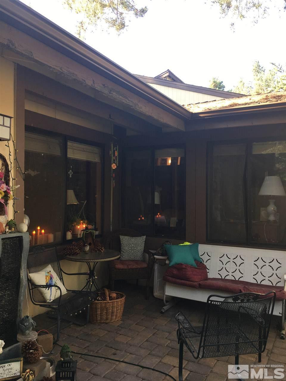 1611 Foster Drive Reno, NV 89509 - Photo 30 of 35 a backyard of a house with seating space