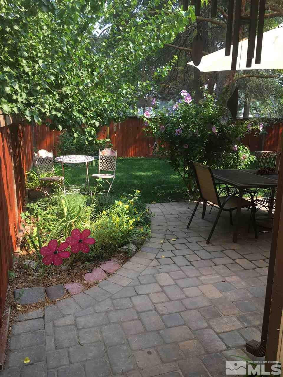 1611 Foster Drive Reno, NV 89509 - Photo 32 of 35 a view of a backyard with sitting area