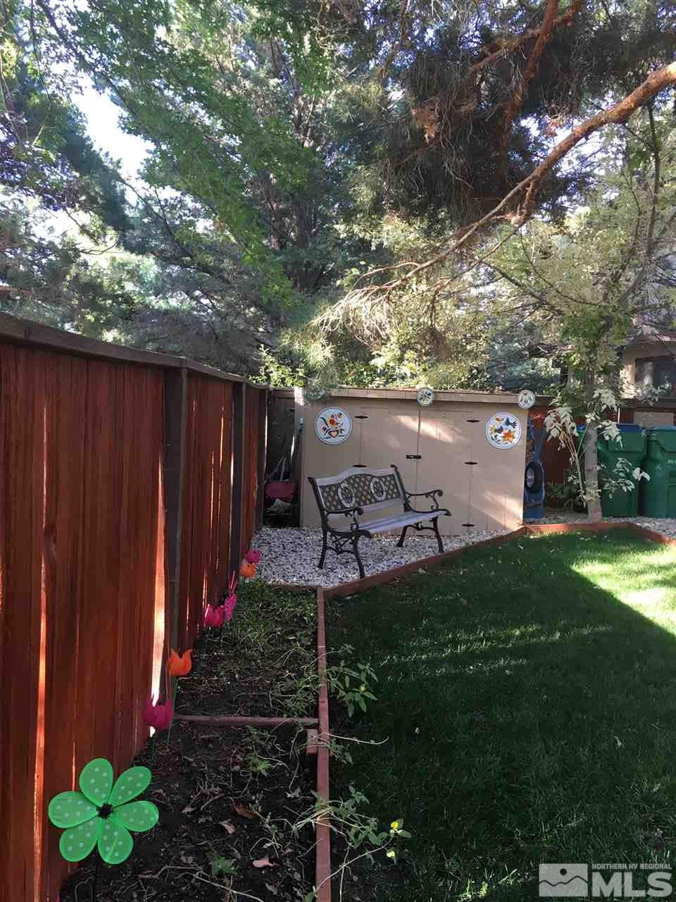 1611 Foster Drive Reno, NV 89509 - Photo 33 of 35 a view of a backyard with pathway