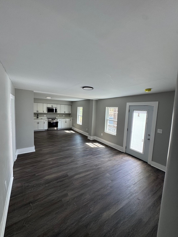 32 Main Street Monson, MA 01057 - Photo 8 of 42 a view of empty room with wooden floor