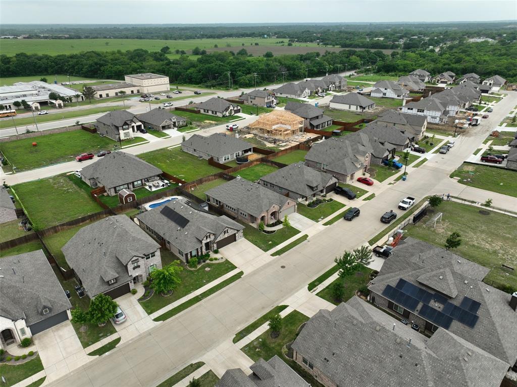 1084 Imperial Eagle Road Alvarado, TX 76009 - Photo 33 of 39 an aerial view of residential houses with outdoor space
