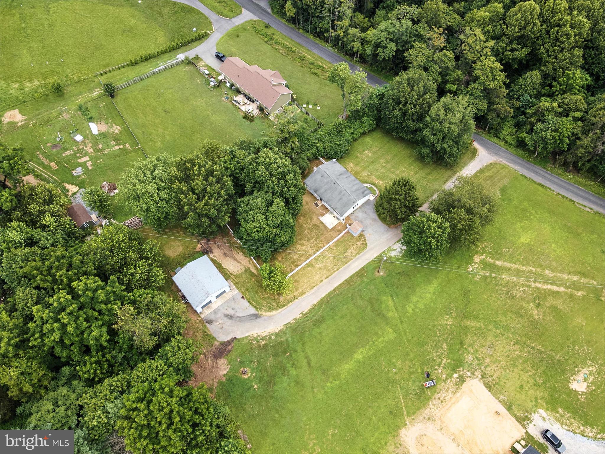 6220 Fulmer Road Frederick, MD 21703 - Photo 4 of 37 an aerial view of residential house with swimming pool
