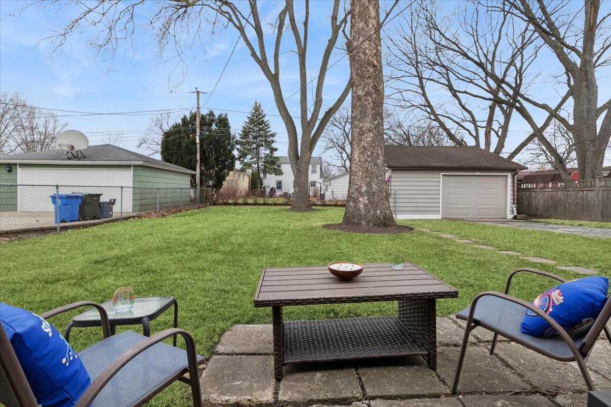 504 North Russel Street Mount Prospect, IL 60056 - Photo 16 of 19 a view of backyard of house with seating space