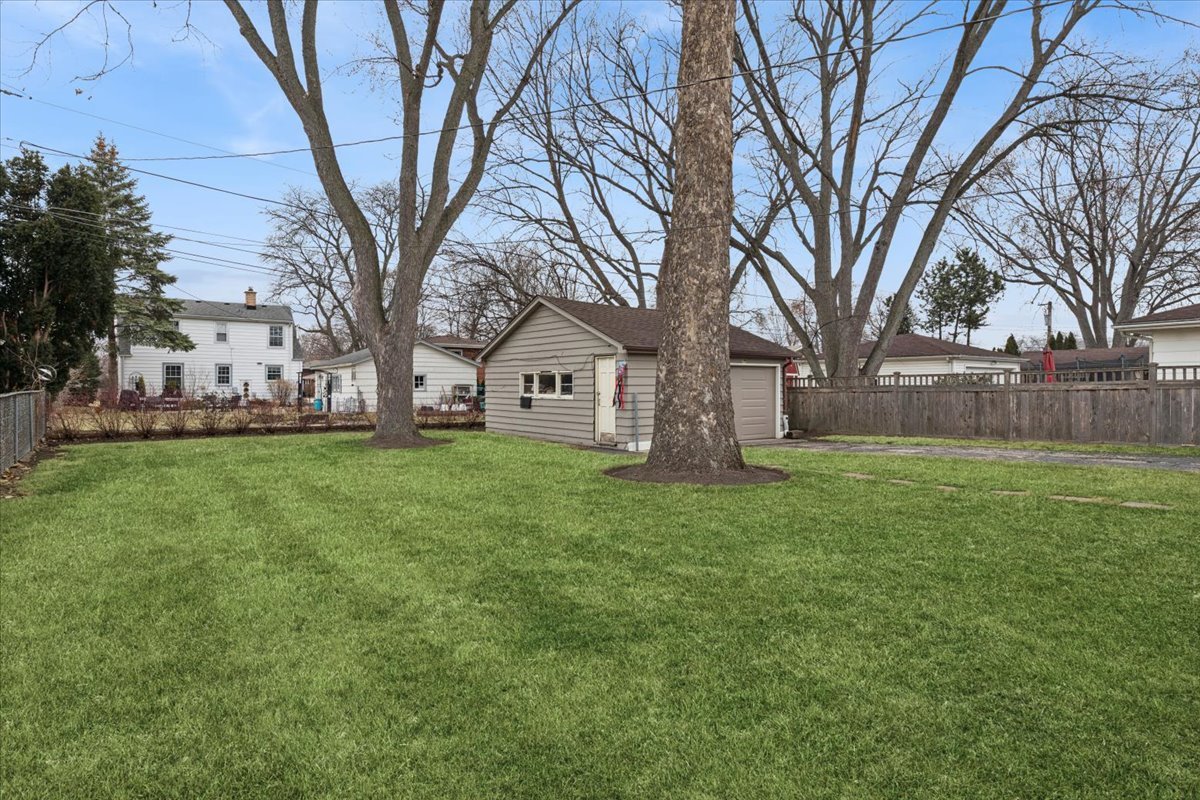 504 North Russel Street Mount Prospect, IL 60056 - Photo 17 of 19 a view of a house with a back yard