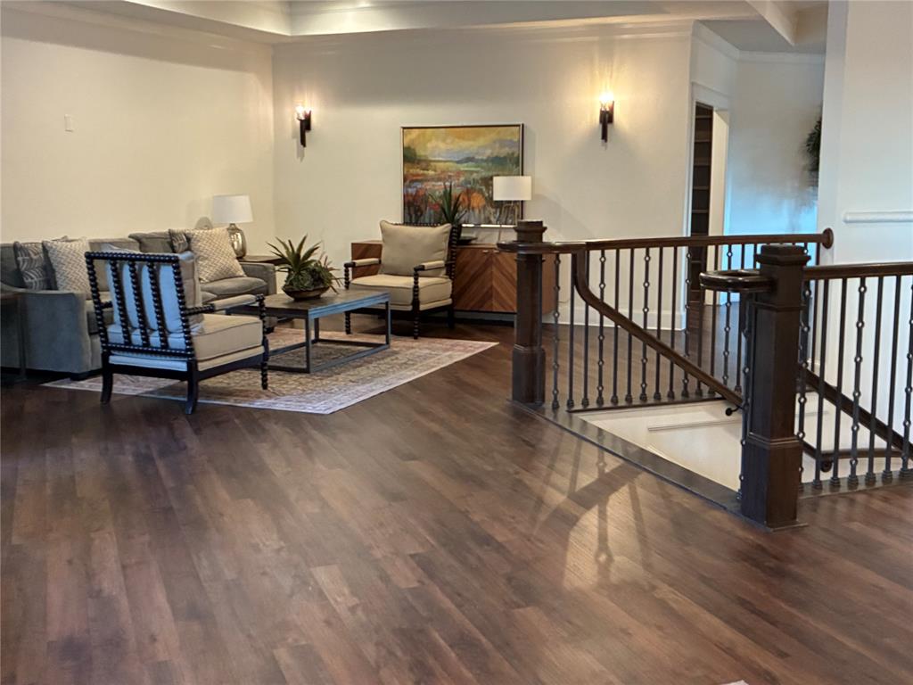 6500 Castle Royle Drive Cleburne, TX 76033 - Photo 12 of 29 a living room with furniture and wooden floor
